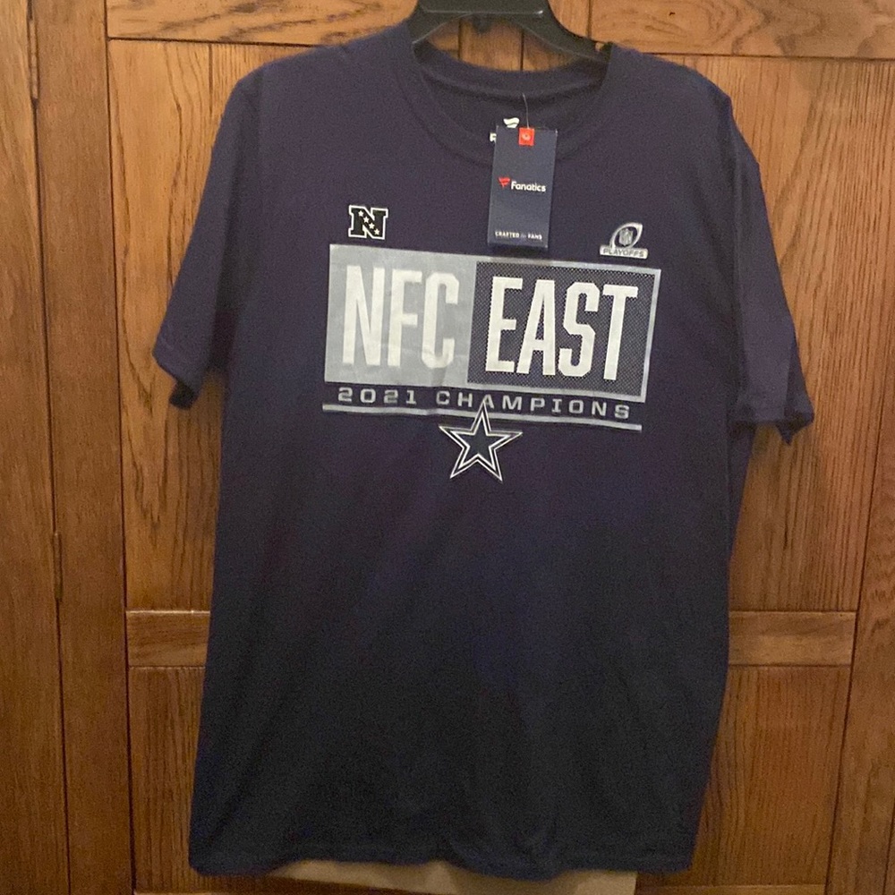 Fanatics NFL
TEAM
APPAREL “NFC EAST 2021 CHAMPIONS”100% Short-Sleeve T-Shirt NWT